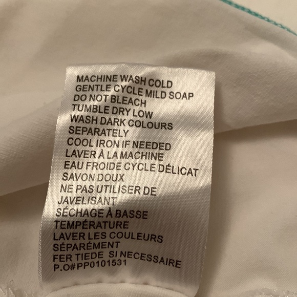 LPGA - ladies white golf tee with cap sleeves, 6 snap button collar - Picture 5 of 5